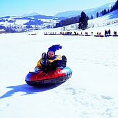 Snowtubing in Tiroler Kaiserwinkl is fun