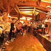 Children dance to live music in the Kaiseralm